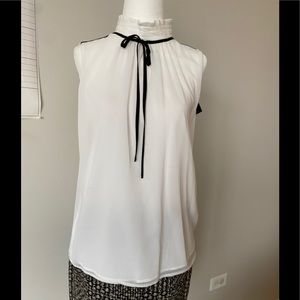 sleeveless white top